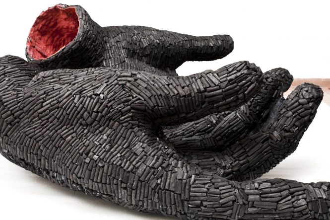 Hands by Shanthamani M., 2010- 12, Wood charcoal with cotton rag pulp, 30 x 36 x 63 inches, Photo Credit: Mallikarjun Katakol